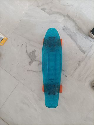 Monopatín skate Penny azul transparente
