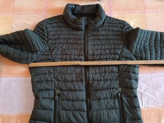 Giubbino trapuntato grigio scuro. tg L.