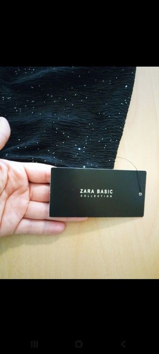 Falda negra midi brillo ✨