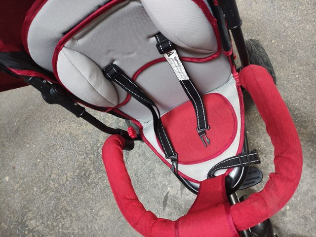 Triciclo infantil rojo con capota besrey 7 en 1
