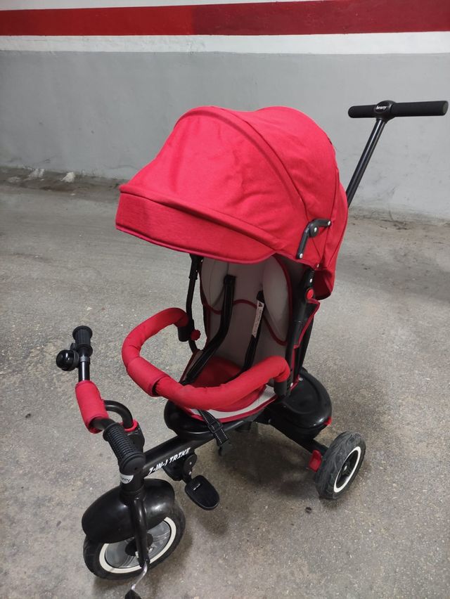 Triciclo infantil rojo con capota besrey 7 en 1
