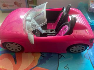 Coche Barbie rosa brillante