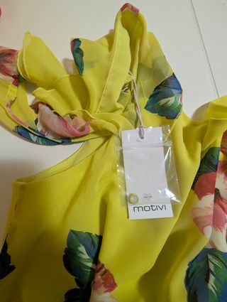 Tuta Motivi gialla fiori taglia 42 Mai indossato