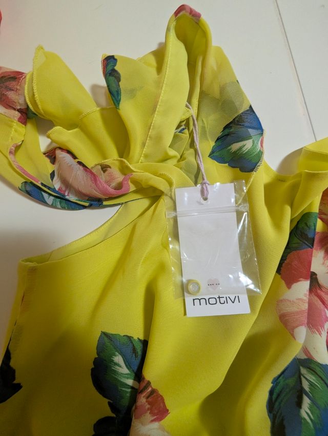 Tuta Motivi gialla fiori taglia 42 Mai indossato