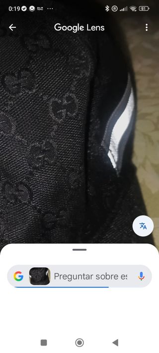 Gorra Gucci negra y plata
