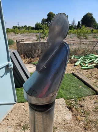 Chimenea metalica con sombrerete