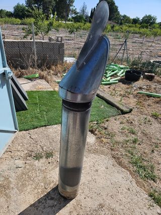 Chimenea metalica con sombrerete