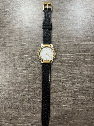 Reloj Radiant dorado y plateado