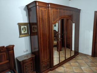 Dormitorio clásico madera