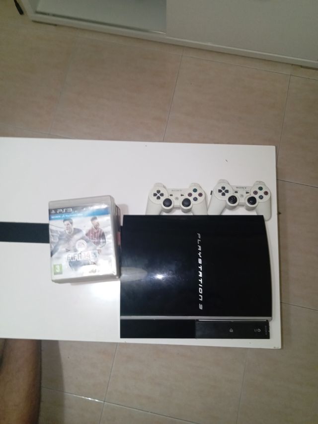 PS3 para arreglar o piezas + juegos + 2mandos