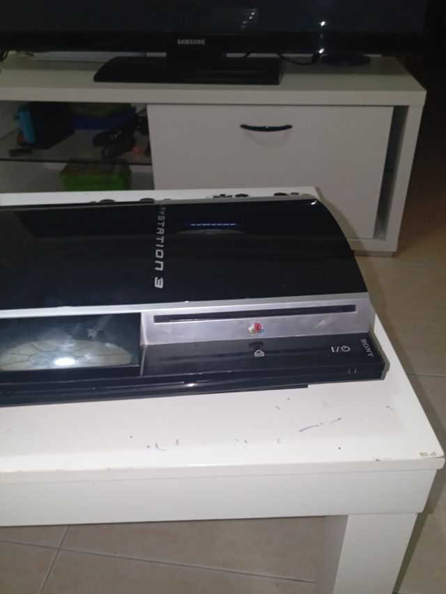 PS3 para arreglar o piezas + juegos + 2mandos