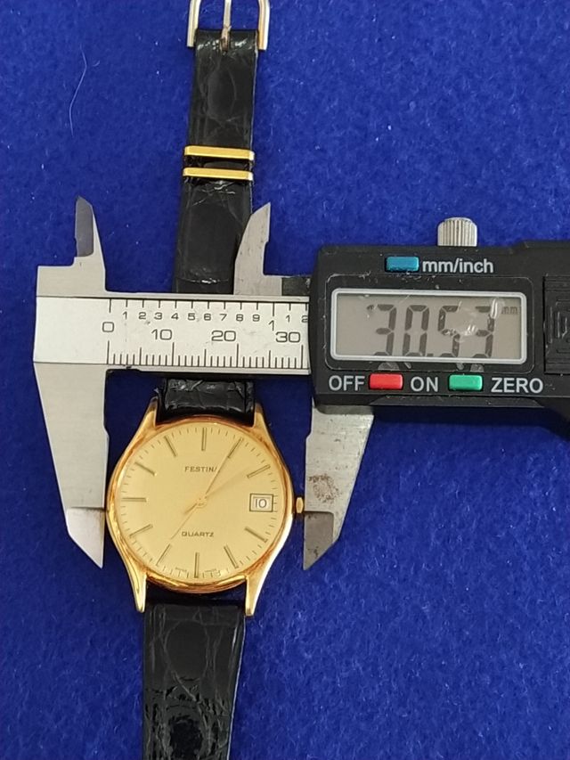 Reloj Festina nuevo stock de relojeria cuarzo dora