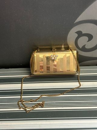 Bolso de fiesta metálico dorado