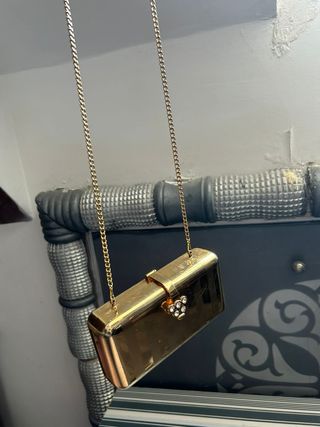 Bolso de fiesta metálico dorado