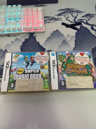 Nintendo DSi XL burdeos + juegos