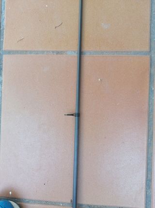 Caña de pescar de spinning telescópica.