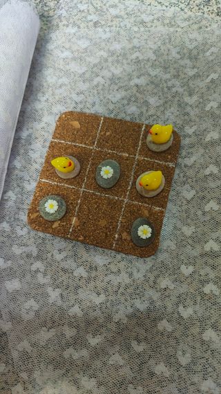 Tres en raya: patitos y flores.