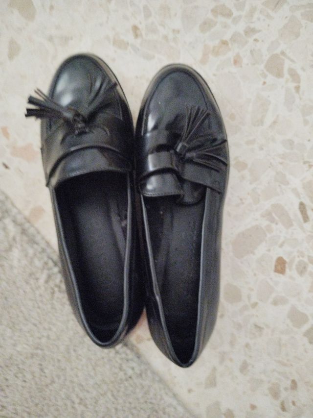 Mocasines negros con borlas