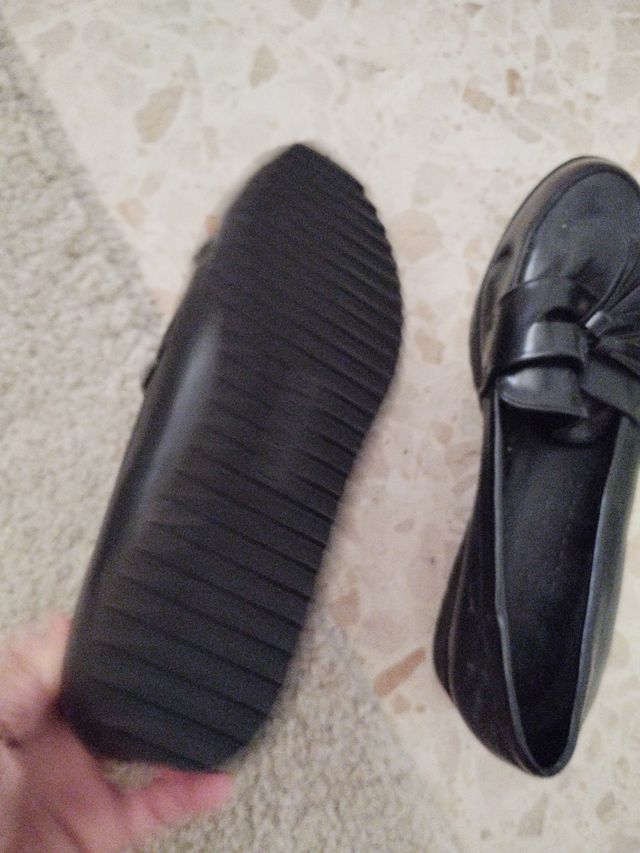 Mocasines negros con borlas