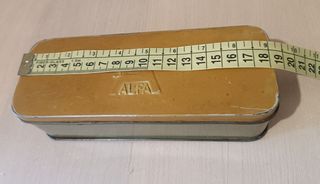 Lata Alfa de costura Vintage