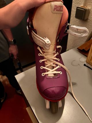 Patines Roces M12 LO de color morado y rosa fucsia
