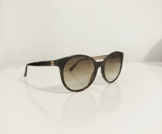 Gafas Gucci redondas marrones