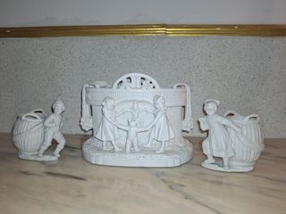 Set di statuine in porcellana bianca