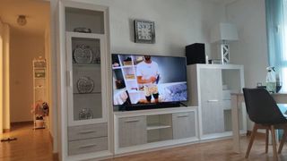 Mueble TV salón moderno lleva luces estánteria
