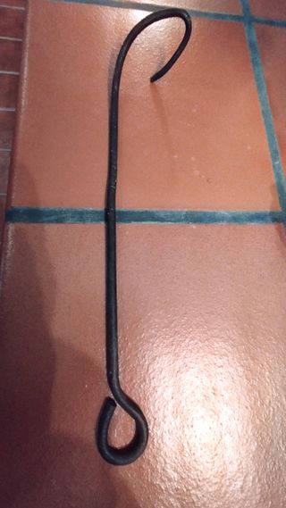 Atizador antiguo para chimenea