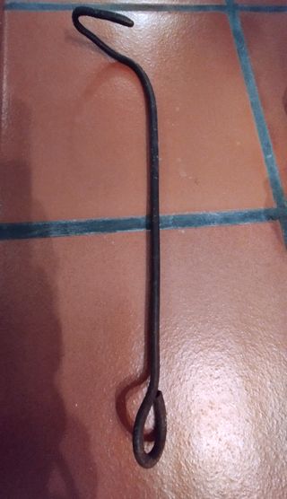 Atizador antiguo para chimenea