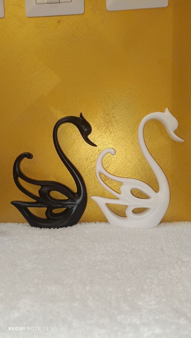 2 cisnes de ceramica