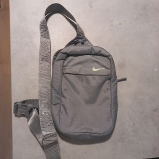 Bandolera Nike gris