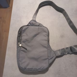 Bandolera Nike gris