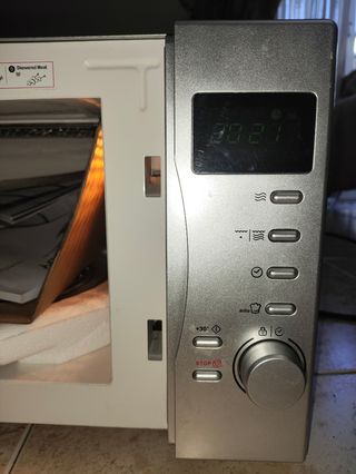 Microondas Candy CMG2071DS 20L plata