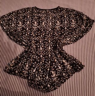 Blusa negra y blanca MK Tex