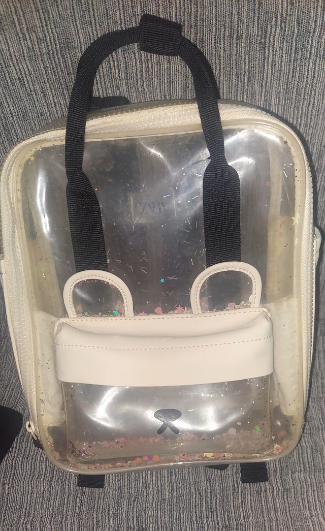 Mochila transparente con purpurina