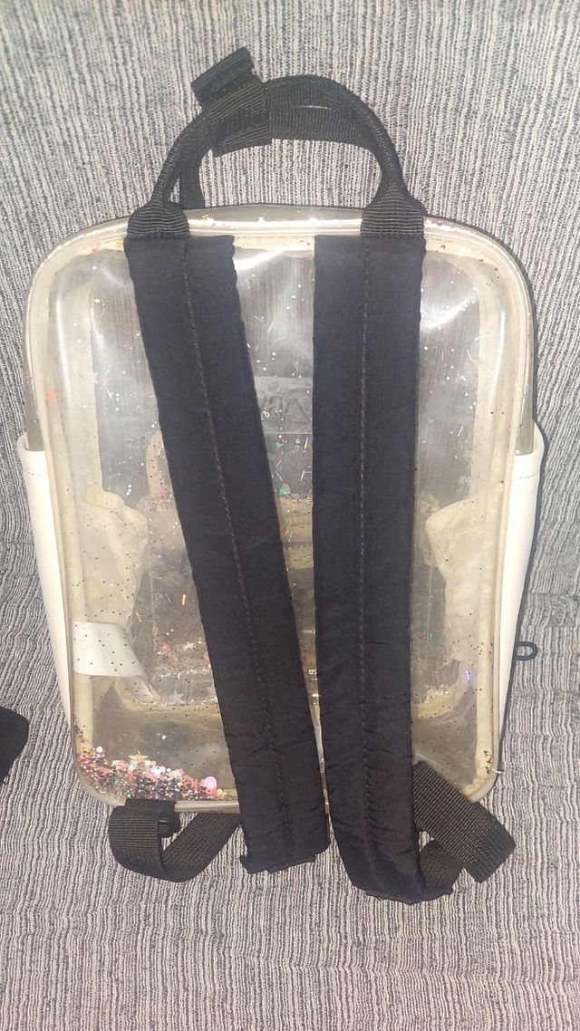 Mochila transparente con purpurina