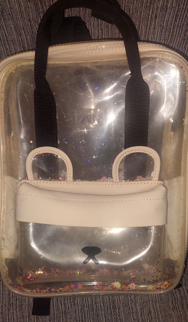 Mochila transparente con purpurina