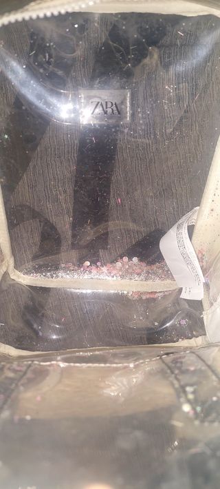 Mochila transparente con purpurina