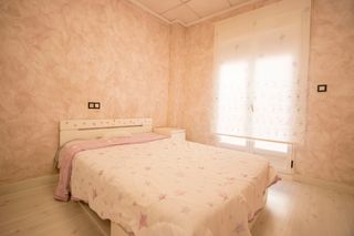Casa adosada reformada con garaje