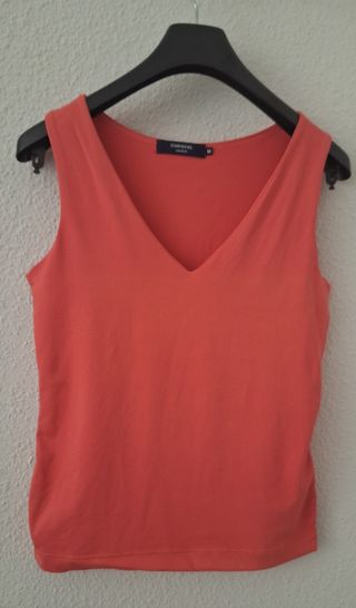 Camiseta elástica naranja rosa. Talla M