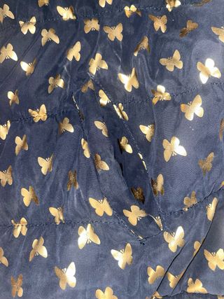 Chaqueta niña | Pluma dorada
Talla 9-10 