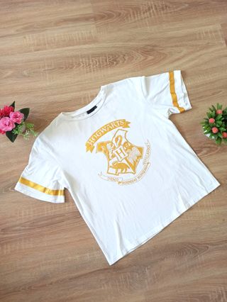 Camiseta Hogwarts dorada y blanca - Talla S
