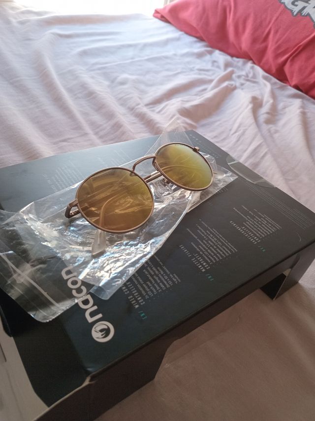 Gafas redondas doradas