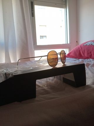 Gafas redondas doradas