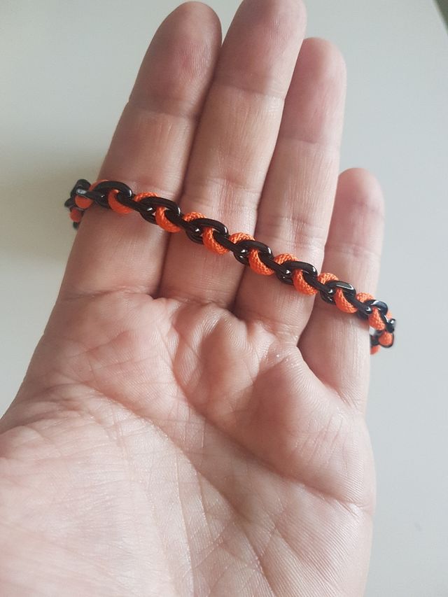 Pulsera Lotus Style negra y naranja