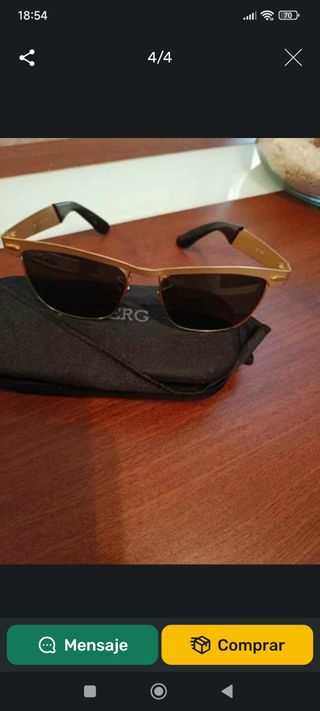 Ray-Ban: Gafas sol doradas