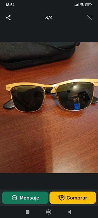 Ray-Ban: Gafas sol doradas