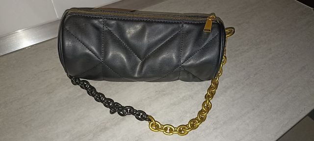 Bolso bandolera negro y dorado