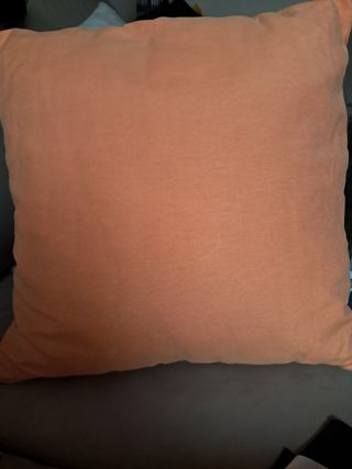 Almofada laranja decorativa